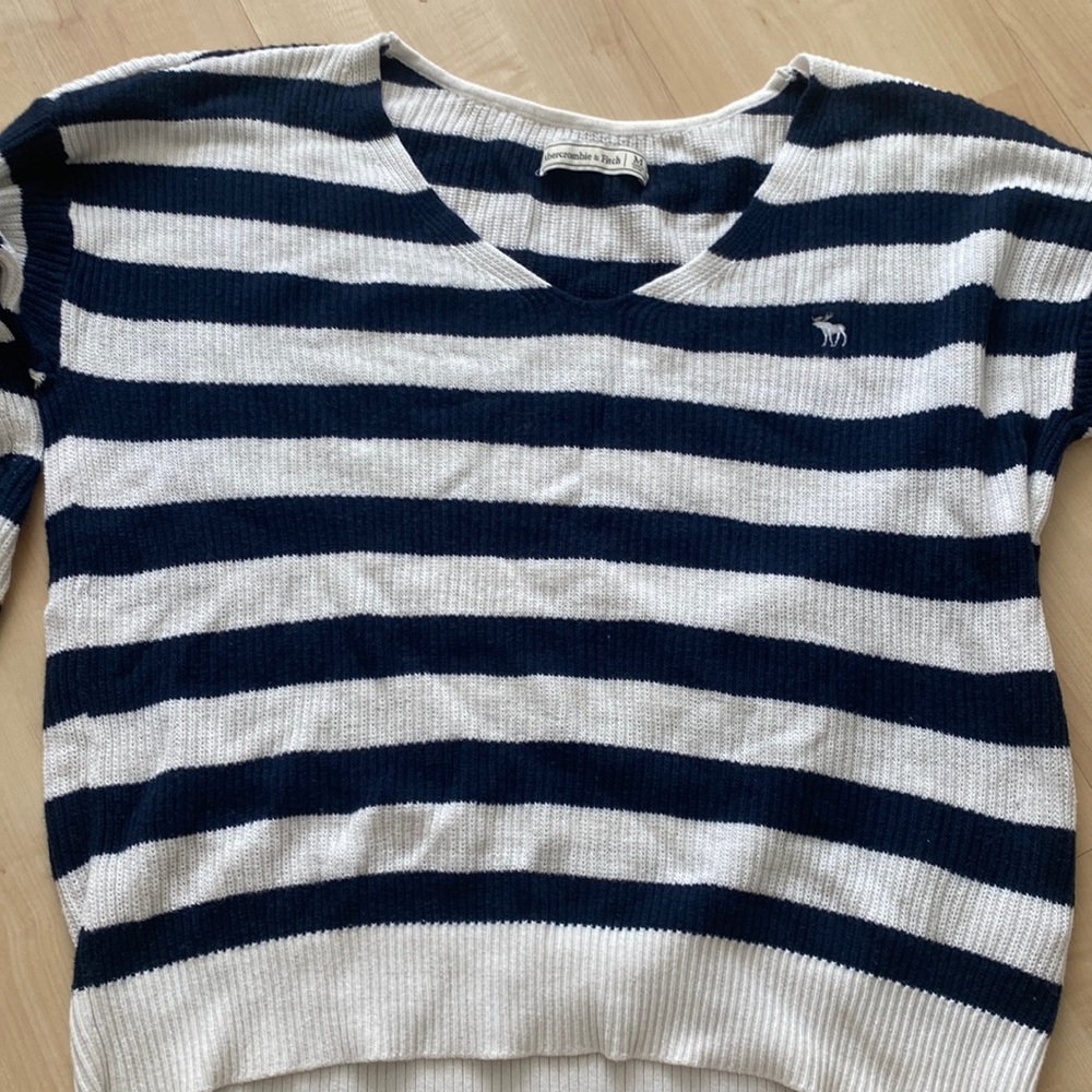 Blue and white striped sweater